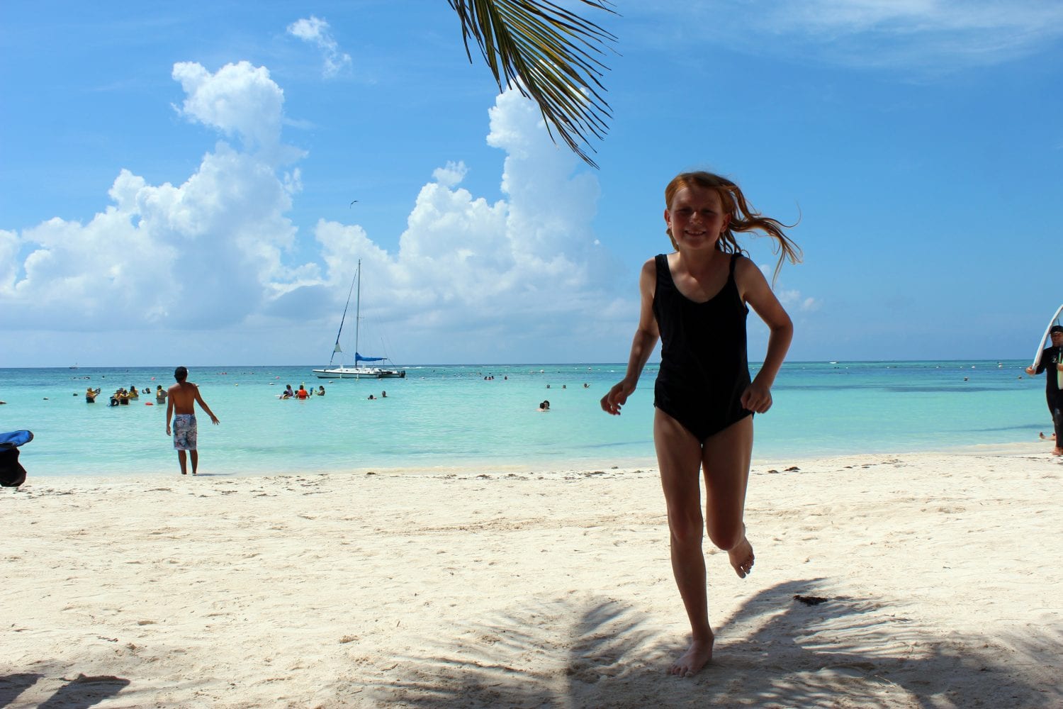 My daughter on Akumal Beach